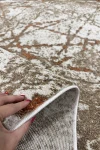 Елипсовиден абстрактен килим Trend с теракота