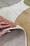 Абстрактен килим Артист с неправилна овална форма