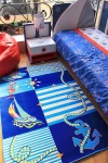 Син детски килим с морска тематика