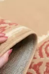 Бежов килим Арте с розова рамка