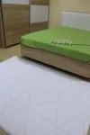 Бял килим Уникат на триъгълници