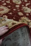 Вълнен античен килим в червено