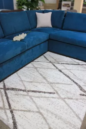 Бял мек килим Флъфи на линии